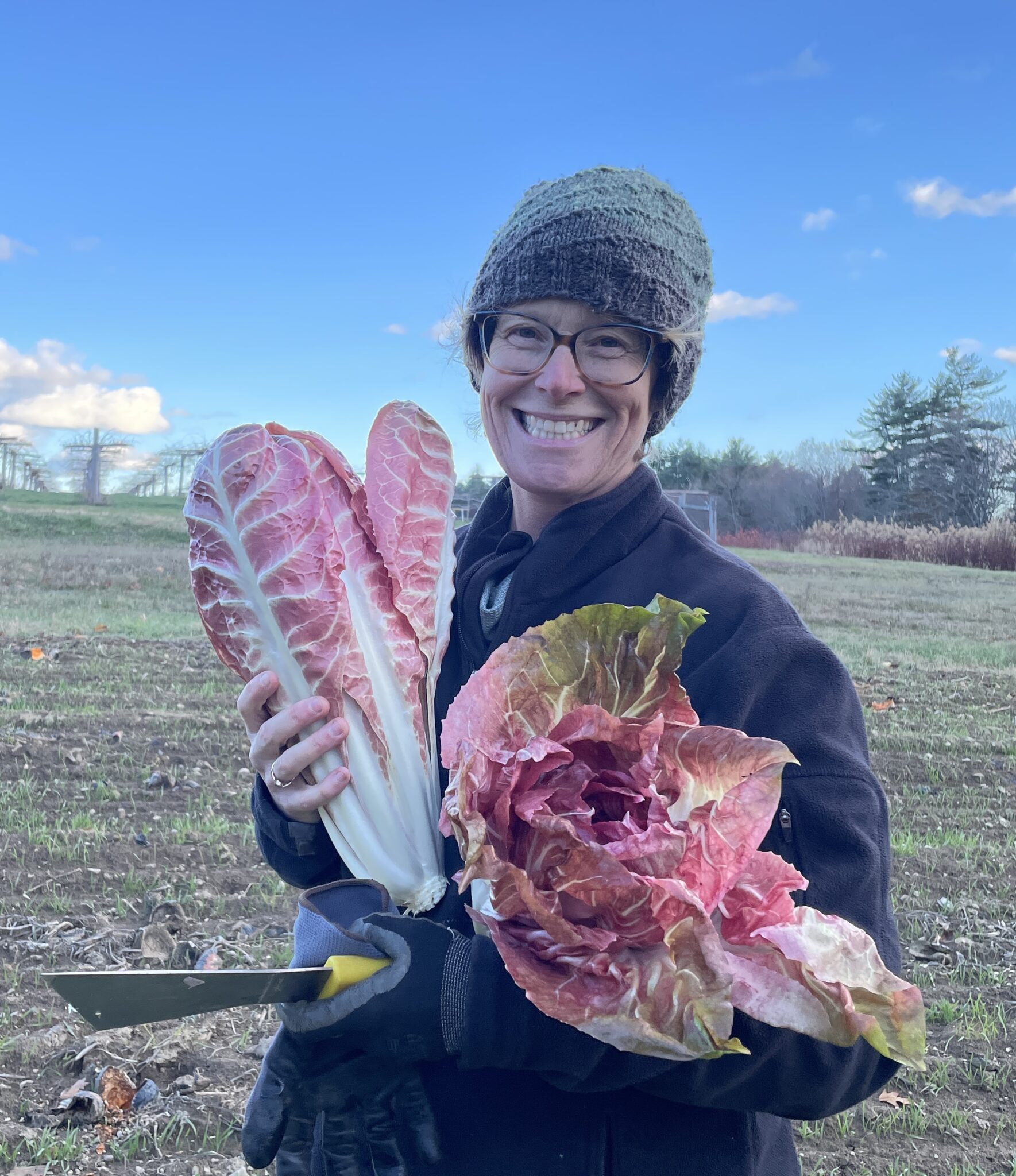 Becky Becky holding heads of radicchio